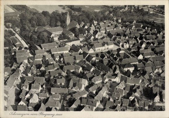 Postcard Schwaigern in Württemberg, aerial view of many roofs, church visible