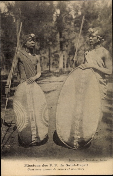 Postcard African warriors armed with spears and shields