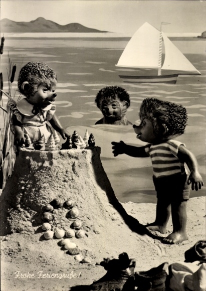 Postcard Mecki the hedgehog, happy holiday greetings, hedgehog children on the beach, sand castle