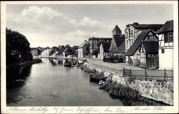 Postcard Plau am See Mecklenburg, on the Elde, half-timbered house, boats, church tower