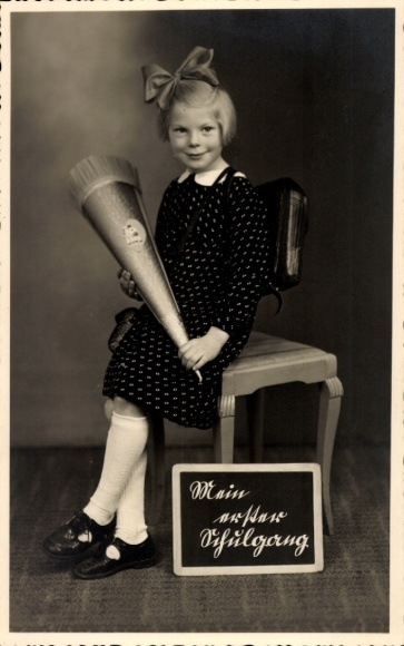 Postcard Congratulations back to school, girl with candy cone
