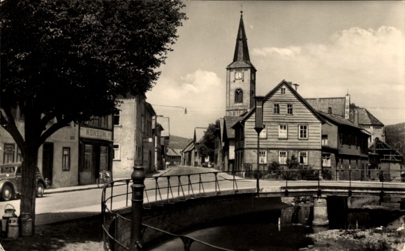 Ak Kaltennordheim in der Rhön, Stadtansicht, Kirche, Brücke, Konsum, alte Gebäude