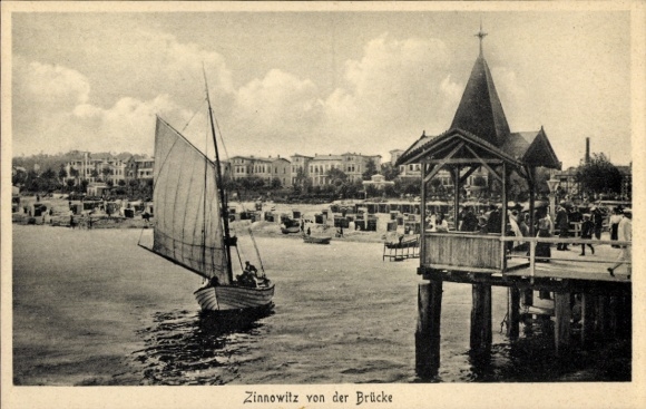 Picture of Baltic Sea resort Zinnowitz on Usedom, sailing boat, bridge, beach, buildings in the background