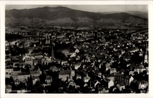 PC Offenburg in Baden Black Forest, black and white picture of houses, mountains in the background