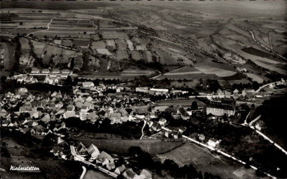Postcard Niederstetten in Baden Württemberg, aerial view of rural surroundings, many roofs, fields