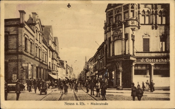 Ak Neuss am Rhein, Stadtansicht, Niederstraße, J. Gottschalk, Menschen auf der Straße