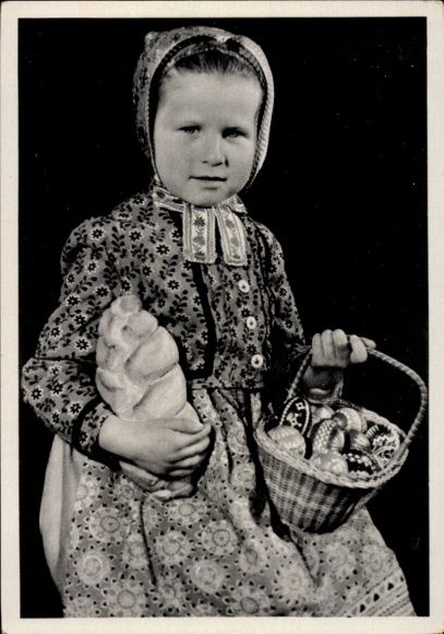 PC Schleife in Upper Lusatia, Sorbian girl with Easter egg basket and Easter braid