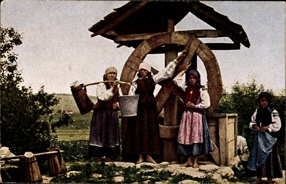 Postcard Balkan, peasant women at the village well, wooden wheel, bucket