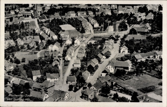 Ak Merchweiler im Saarland, Luftaufnahme von Merchweiler-Saar, Häuser, Straßen, Bäume