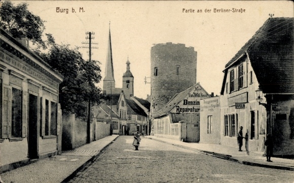 Postcard Burg near Magdeburg, beautiful street in Burg, church in the background, building