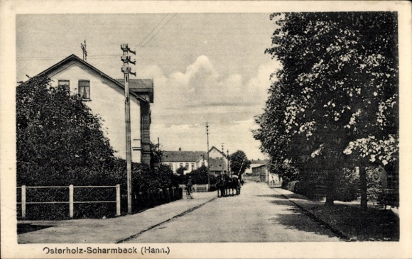 Ansichtkaart Osterholz Scharmbeck in Nedersaksen, straatbeeld met paardenkar