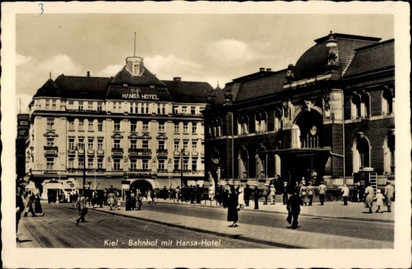 Postcard Kiel in Schleswig Holstein, train station with Hansa Hotel