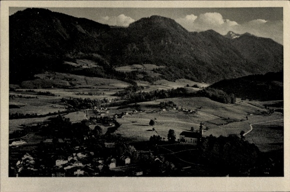 Postcard Ruhpolding in Upper Bavaria, aerial view of the village, mountains in the background, wide meadows, isolated