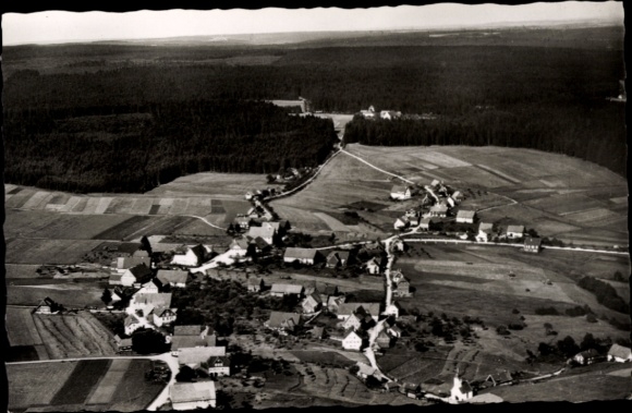 Ak Besenfeld Seewald im Schwarzwald, Luftaufnahme eines Dorfes, umgeben von Feldern und Wäldern