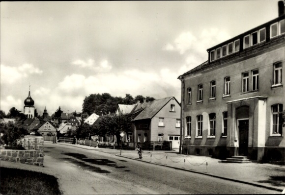 PC Wernesgrün Steinberg in the Vogtland, black and white picture, street with buildings, church in the background...