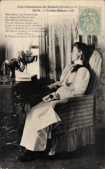 Postcard woman in armchair with sewing machine