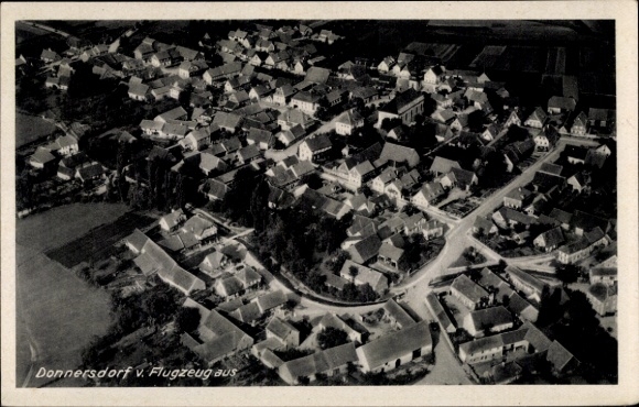 Postcard Donnersdorf in the Steigerwald Lower Franconia, aerial view of numerous houses, rural surroundings