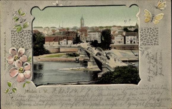 Ak Minden in Westfalen, Farbige Ansicht einer Stadtbrücke, Häuser im Hintergrund, Blumenrahmen