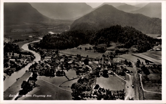 Postcard Eschenlohe in Upper Bavaria, aerial view of mountains in the background, river visible