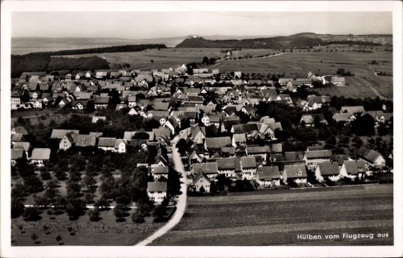Postcard Hülben in the Swabian Alb, aerial view of many houses, rural surroundings, wide fields