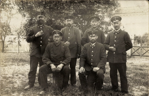 Photo Postcard Men in uniforms, railway workers, group shot