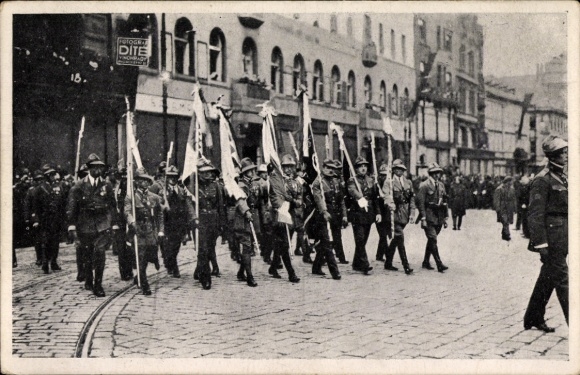 Postcard Czech Republic, men in uniforms with standards