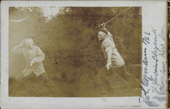 Photo Postcard Two soldiers in the Mogilno hospital, mock fight with walking sticks