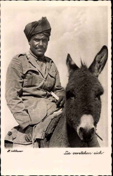 Photo man on a donkey, photo H. Schlösser