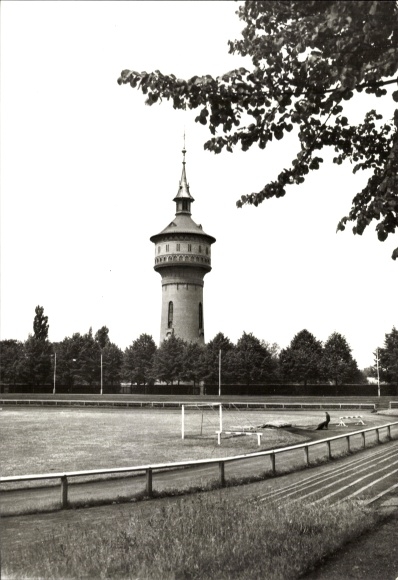 Postcard Forst in the Lusatia, water tower, stadium, trees, football field, black and white photo