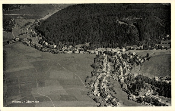 Postcard Altenau Oberharz, aerial photograph of the village, forests