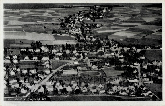 Postcard Lauter Bernsbach in the Ore Mountains Saxony, aerial view of rural landscape, houses, road