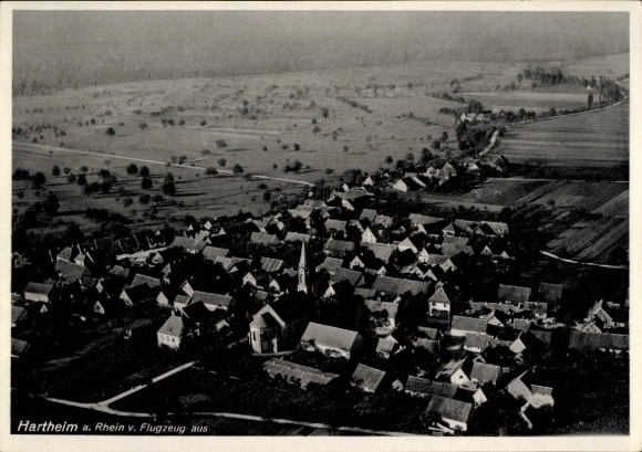 Postcard Hartheim am Rhein, aerial view of Hartheim, residential buildings, landscape, church