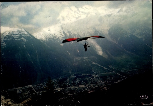 Postcard Paraglider over the valley of Chamonix Mont Blanc