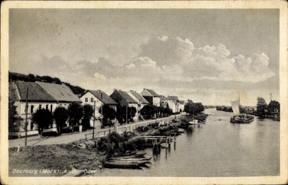 Postcard Oderberg in der Mark, picture of a city view, row of houses, river, boats, clouds