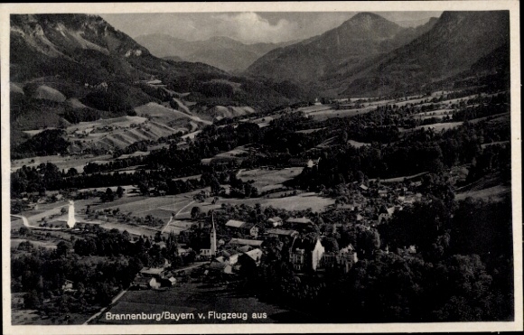 Postcard Brannenburg in Upper Bavaria, landscape with mountains, river, numerous trees, beautiful view