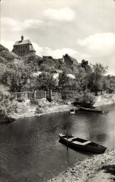 Postcard Havelberg in Saxony-Anhalt, city moat, river, boats, wooded slope