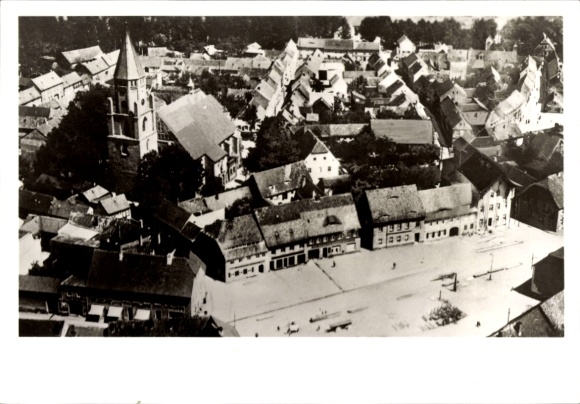 Postcard Hoyerswerda in Upper Lusatia, aerial view of many house roofs, large church
