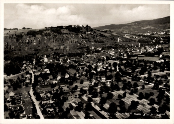 Ak Lörrach in Baden, Luftaufnahme von  hügelige Landschaft, Wohnsiedlungen, Bäume