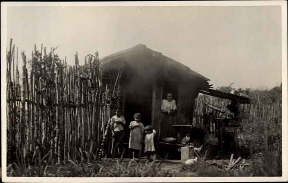 Postcard Brazil, German colonist family in front of their home