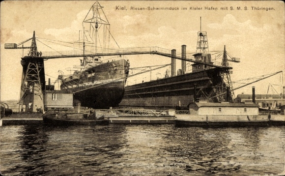 Postcard Kiel, giant floating dock in Kiel harbor, SMS Thüringen, German warship