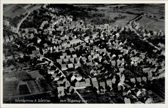 Postcard Waldgirmes Lahnau in Hesse, aerial photograph of Waldgirmes, numerous houses, view from the aircraft