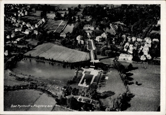 Postcard Bad Pyrmont in Lower Saxony, aerial photograph of landscape, buildings, park