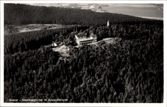 Ak Steinberg Goslar am Harz, Steinberghotel, Aussichtsturm, Waldlandschaft, Luftaufnahme