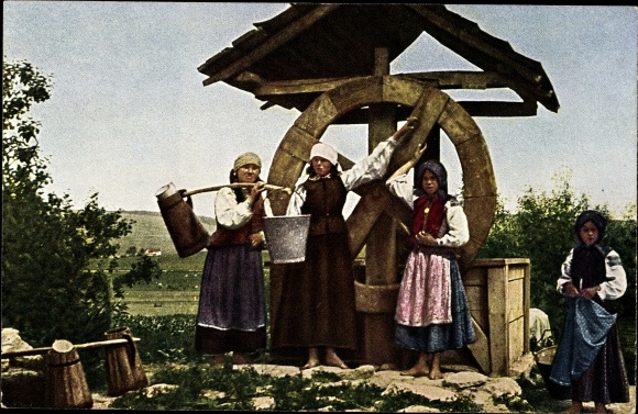 Postcard Balkan, peasant women at the village well, wooden wheel, bucket