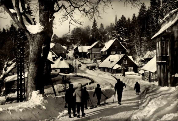 Postcard Schierke Wernigerode in the Harz Mountains, snowy landscape, skiers, houses, trees, church