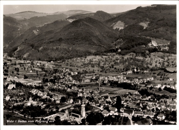 Aerial view of Wehr in Baden, church in the foreground, mountains in the background
