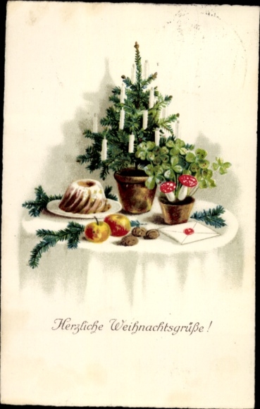 Greeting card with Christmas tree, cake, mushrooms, lucky clover
