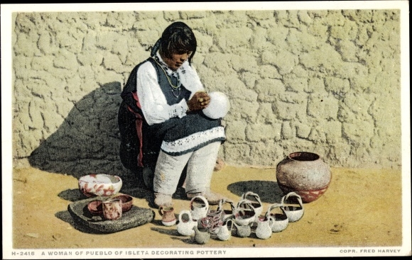 Ak A Woman of Pueblo of Isleta decorating pottery