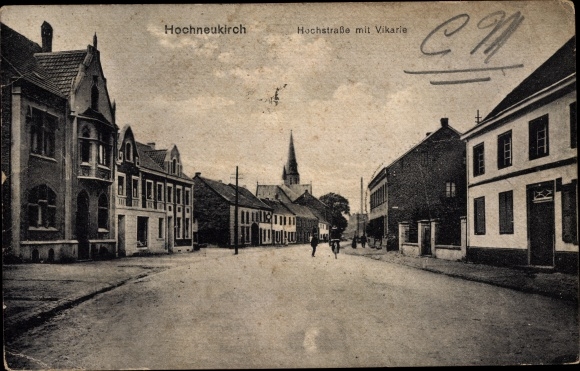 PC Hochneukirch Jüchen North Rhine-Westphalia, elevated road with vicarage