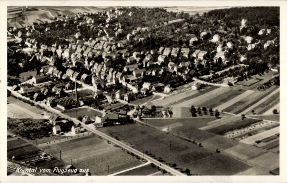 Postcard Korntal in Strohgäu Württemberg, aerial view of residential areas, fields, church, no persons